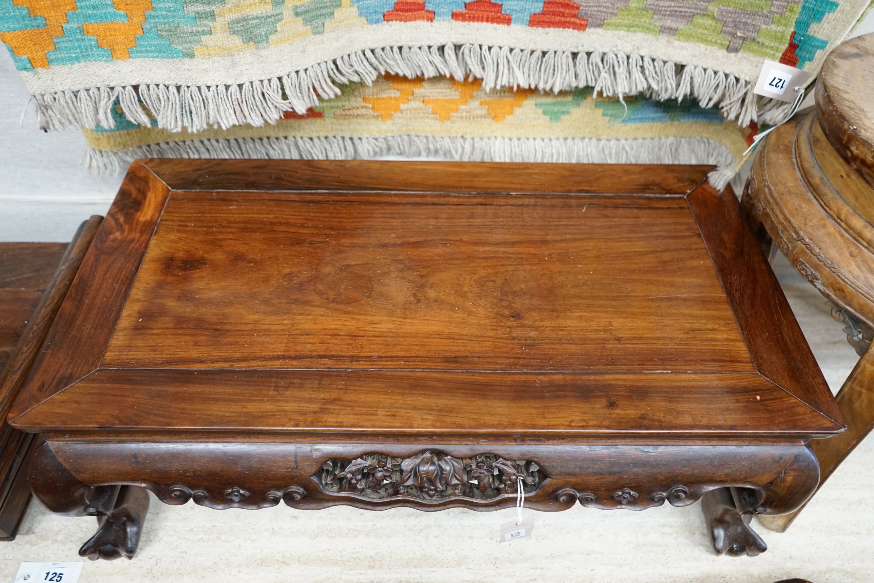 A Chinese hongmu Kang table, 19th century, 79 cm long, 43 cm wide, 27 cm high, old repairs